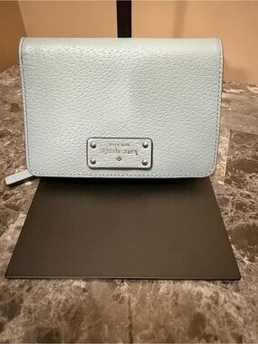 kate spade light blue pebbled leather wallet